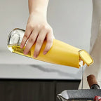 Transparent Glass Oil Bottle with Automatic Opening - Image 2 | Sub Ka Mart